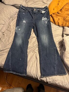 Maurices Dark Blue Distressed Flare Jeans